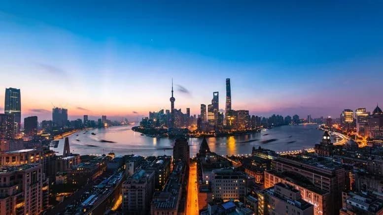 Shanghai skyline over the Huangpu River at dusk