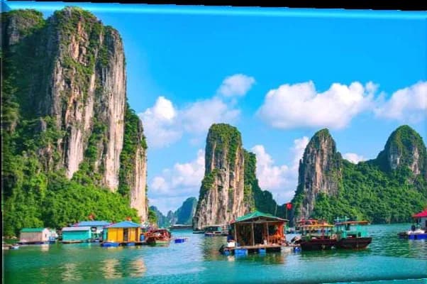 Limestone karsts and floating village, Ha Long Bay